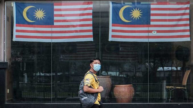 malaysia-cabut-kebijakan-wfh