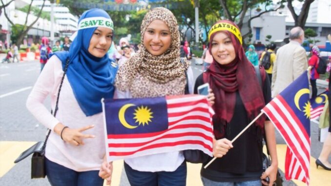 Malaysia Cabut Aturan Wajib Masker