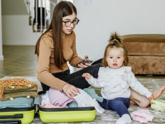 MUDIK membawa bayi