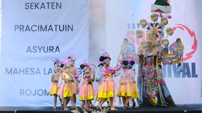 Solo Batik Carnival 2024: Merayakan Warisan Kerajaan Mataram dengan Motif Pisan Bali
