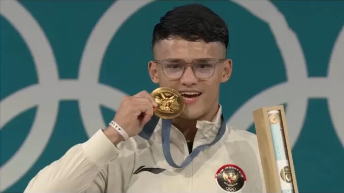 Rizki Juniansyah Pecahkan Rekor Olimpiade dan Raih Medali Emas di Paris 2024 Rizki Juniansyah Pecahkan Rekor Olimpiade dan Raih Medali Emas di Paris 2024