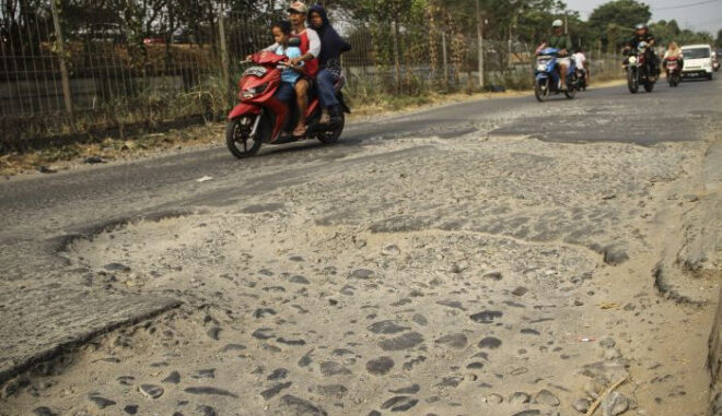 Ilustrasi jalan rusak