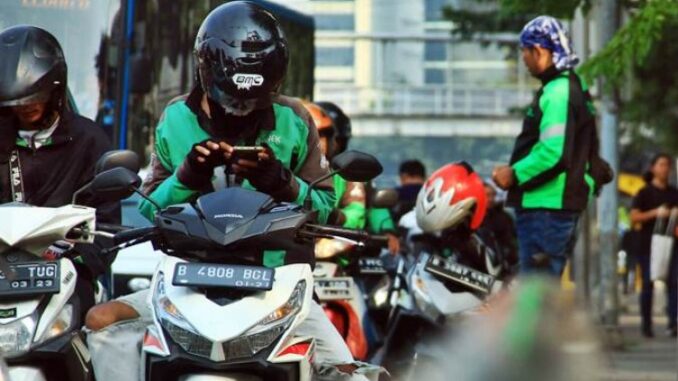 Ilustrasi pengendara ojek online